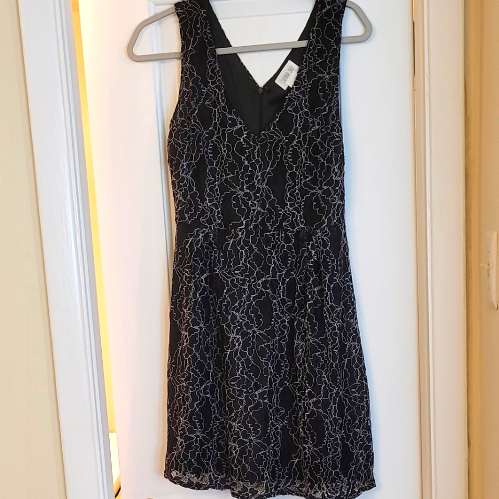 Black dress with white lace flowered print